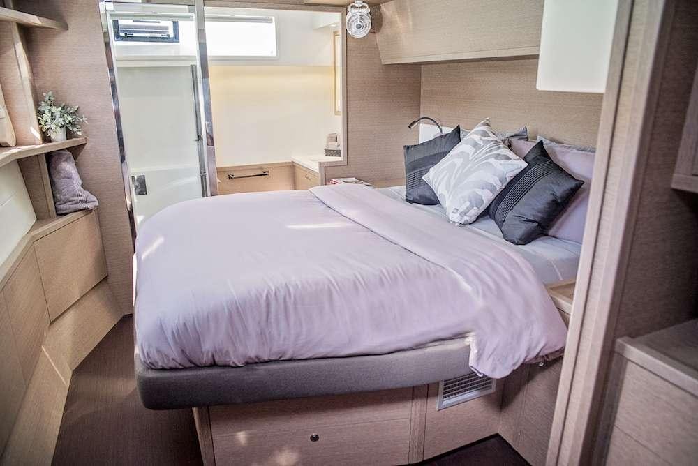 a bed in a room aboard ISLAND HOPPIN' Yacht for Charter