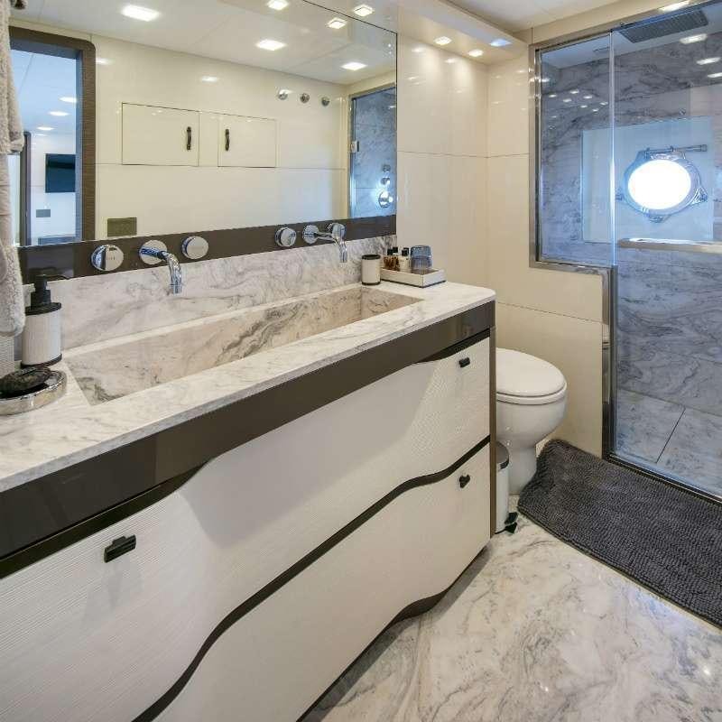 a bathroom with a large countertop aboard ESMERALDA OF THE SEAS Yacht for Charter