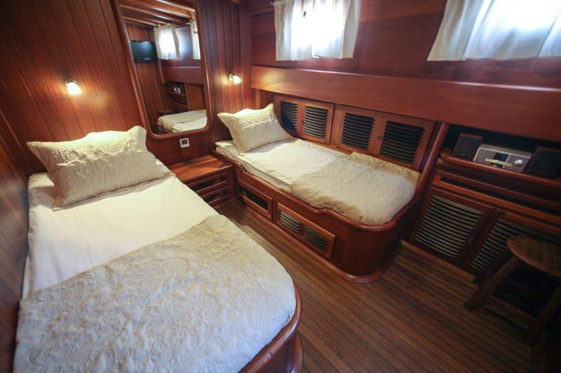 a room with two beds aboard EYLUL DENIZ II Yacht for Charter