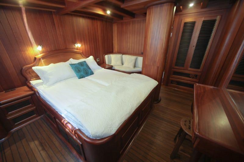 a bed in a room aboard EYLUL DENIZ II Yacht for Charter