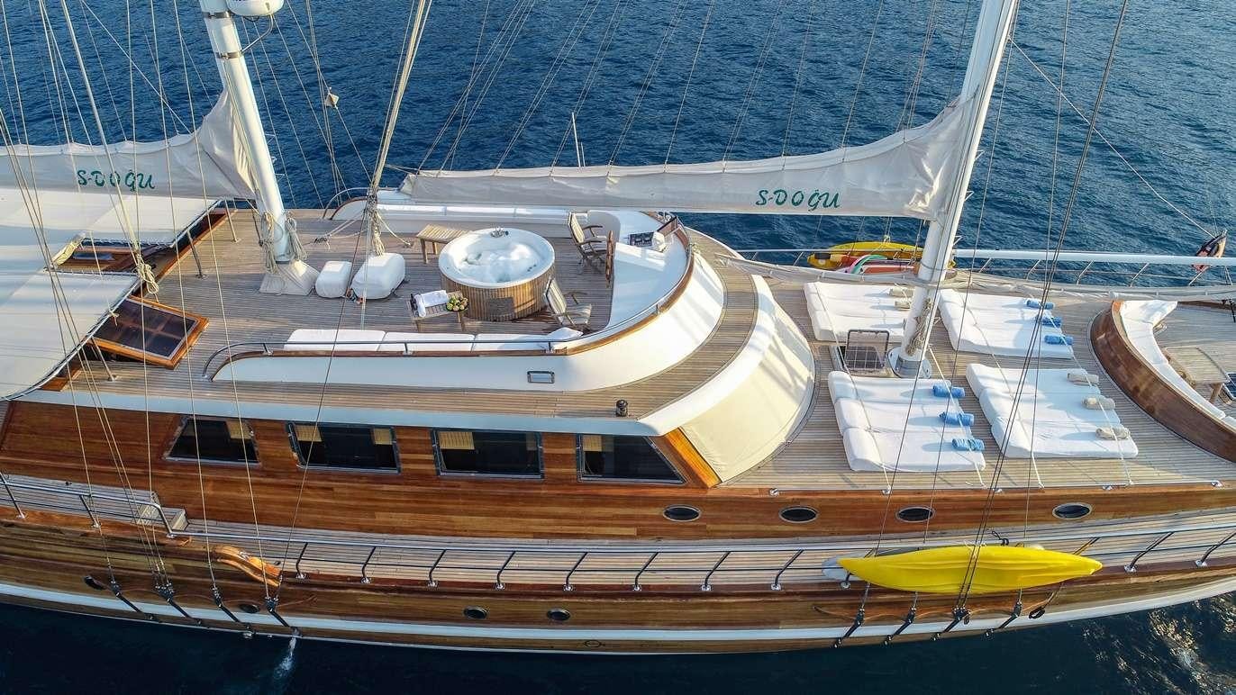 a boat docked at a pier aboard S DOGU Yacht for Charter