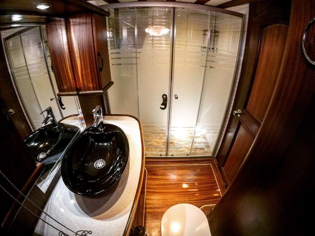 a black kettle on a counter aboard S DOGU Yacht for Charter