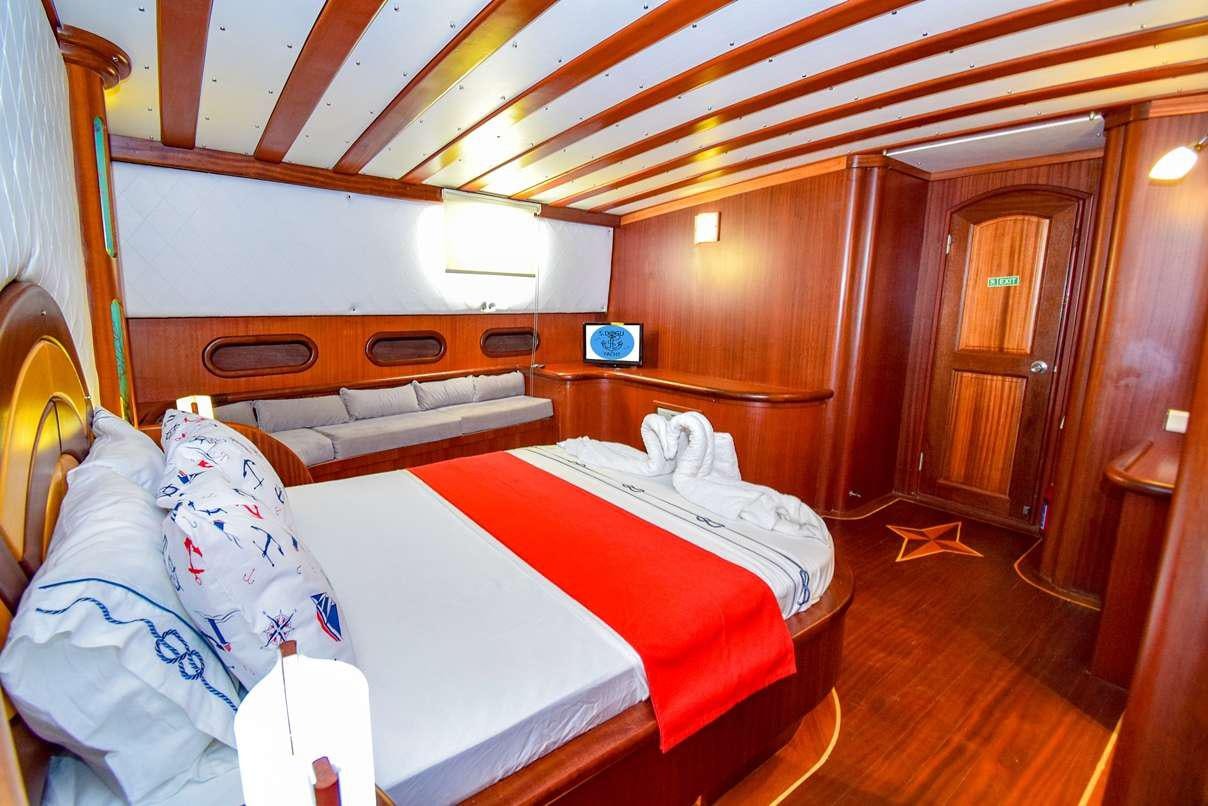 a room with bunk beds aboard S DOGU Yacht for Charter