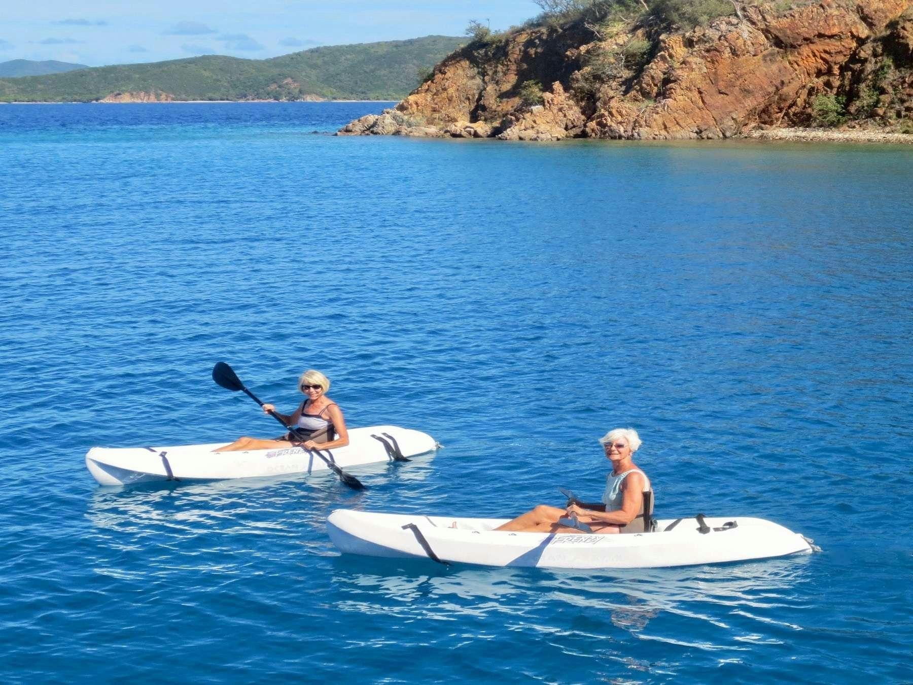 a couple of people in canoes aboard MCGREGOR III Yacht for Charter