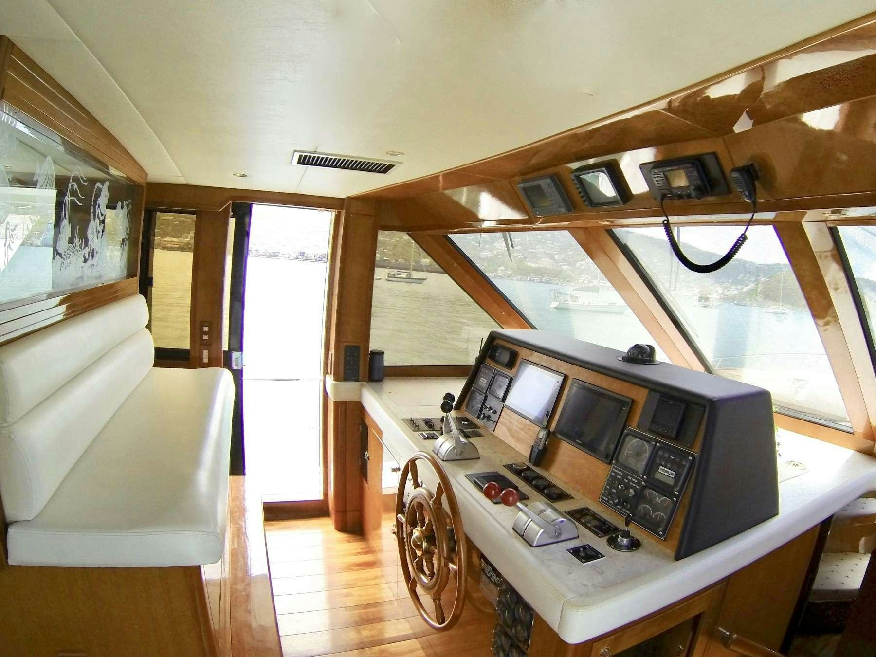 a room with a desk and computer aboard MCGREGOR III Yacht for Charter