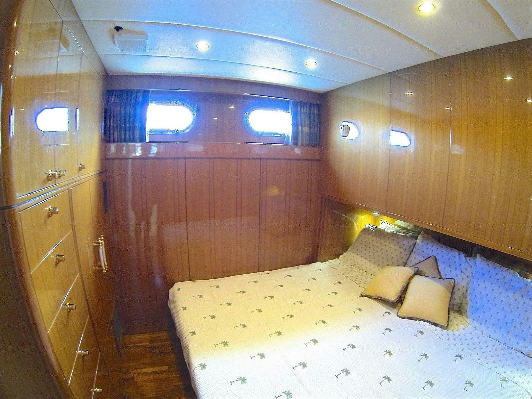 a bed in a cabin aboard MCGREGOR III Yacht for Charter