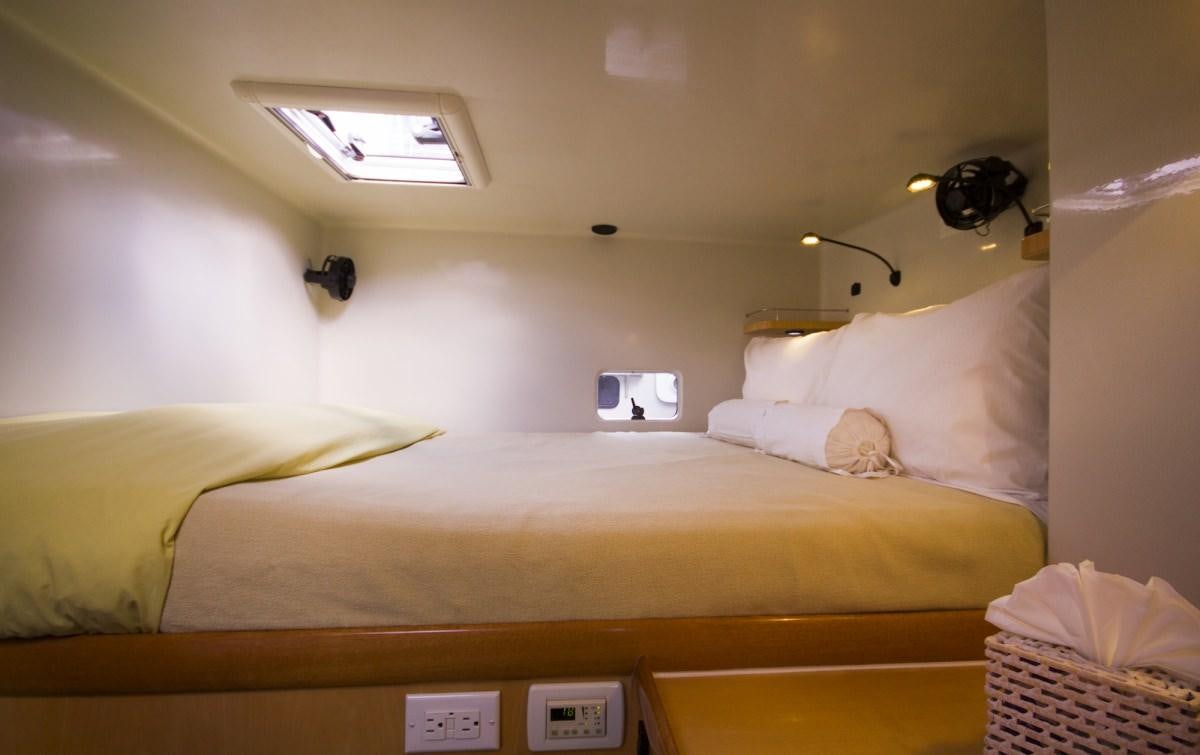 a room with two beds aboard ZENYATTA Yacht for Charter