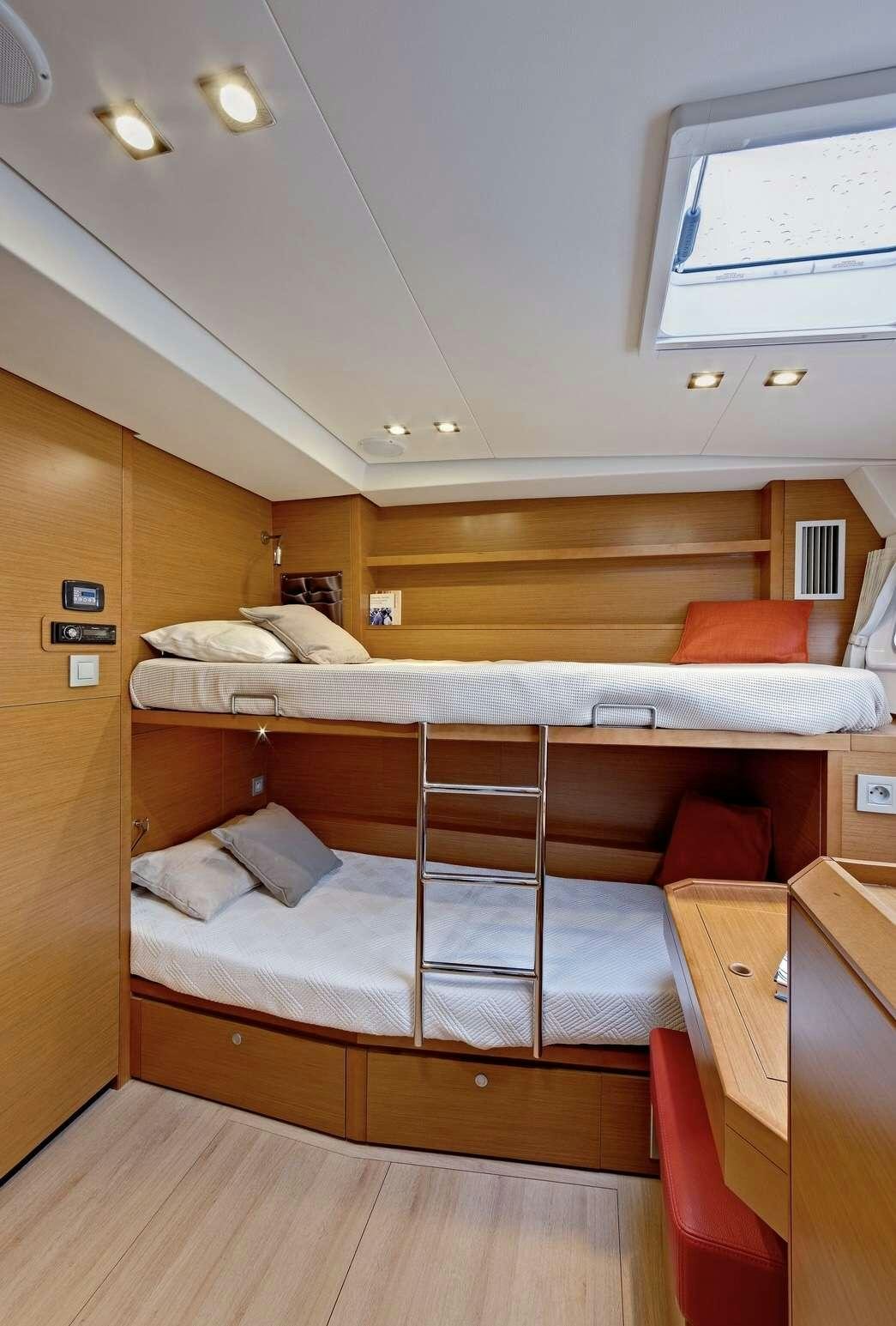 a room with bunk beds aboard GB ODYSSEY Yacht for Charter