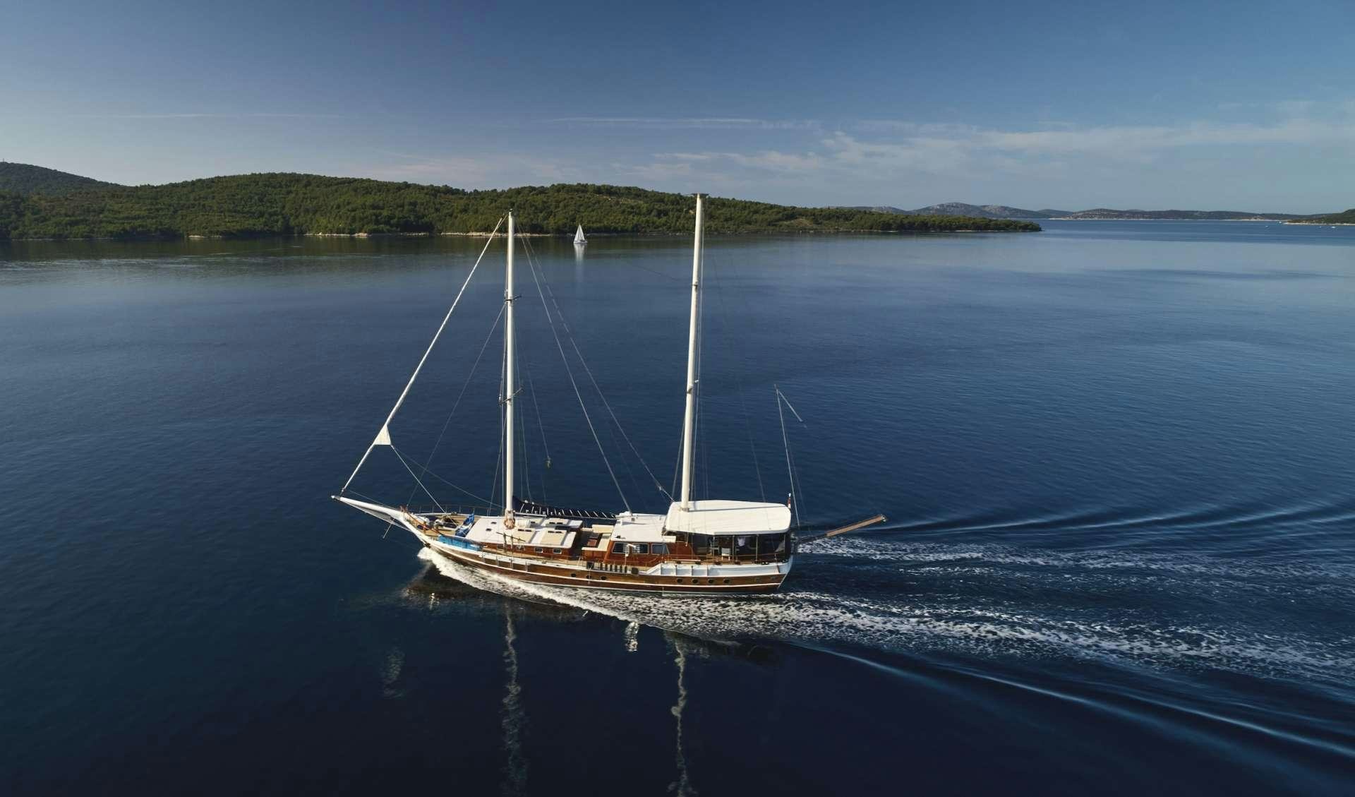 a boat on the water aboard PERLA Yacht for Charter