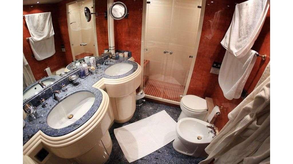 a bathroom with a sink and toilet aboard MINA II Yacht for Charter