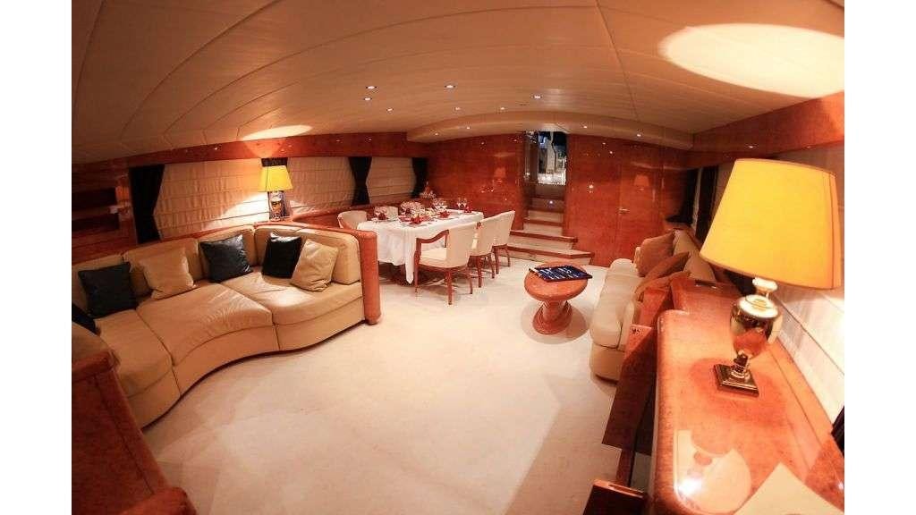 a room with a bed and a table aboard MINA II Yacht for Charter
