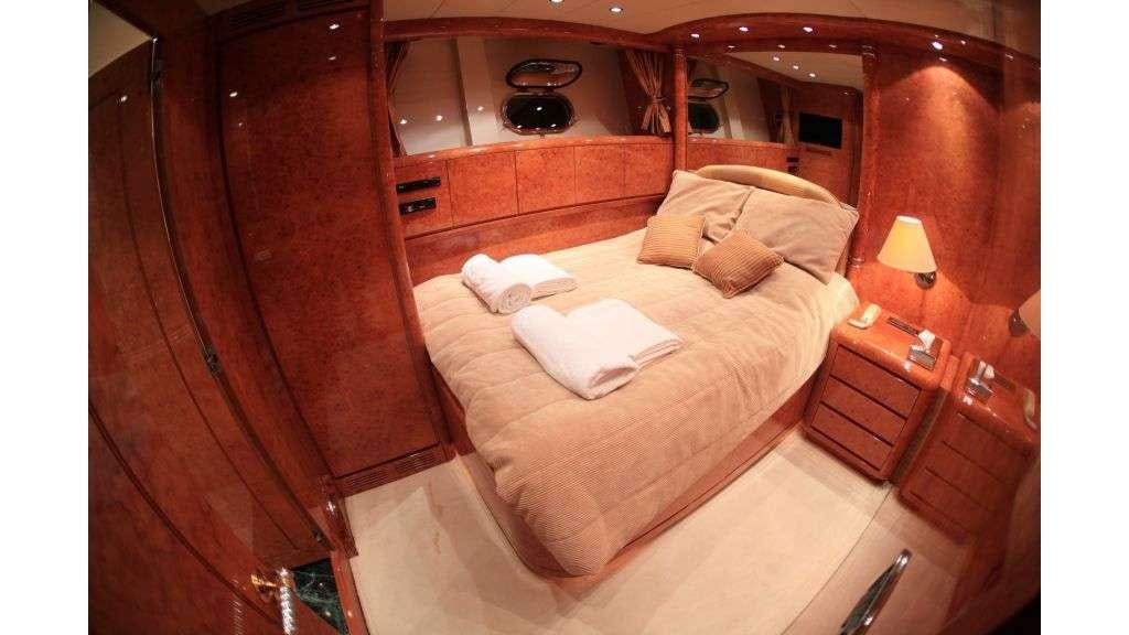 a bed in a room aboard MINA II Yacht for Charter