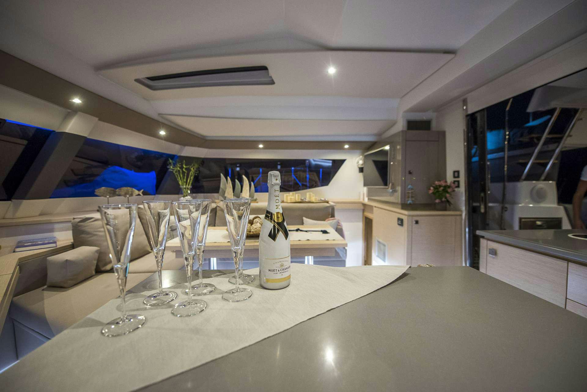 a white vase on a table aboard Sea Energy V Yacht for Charter