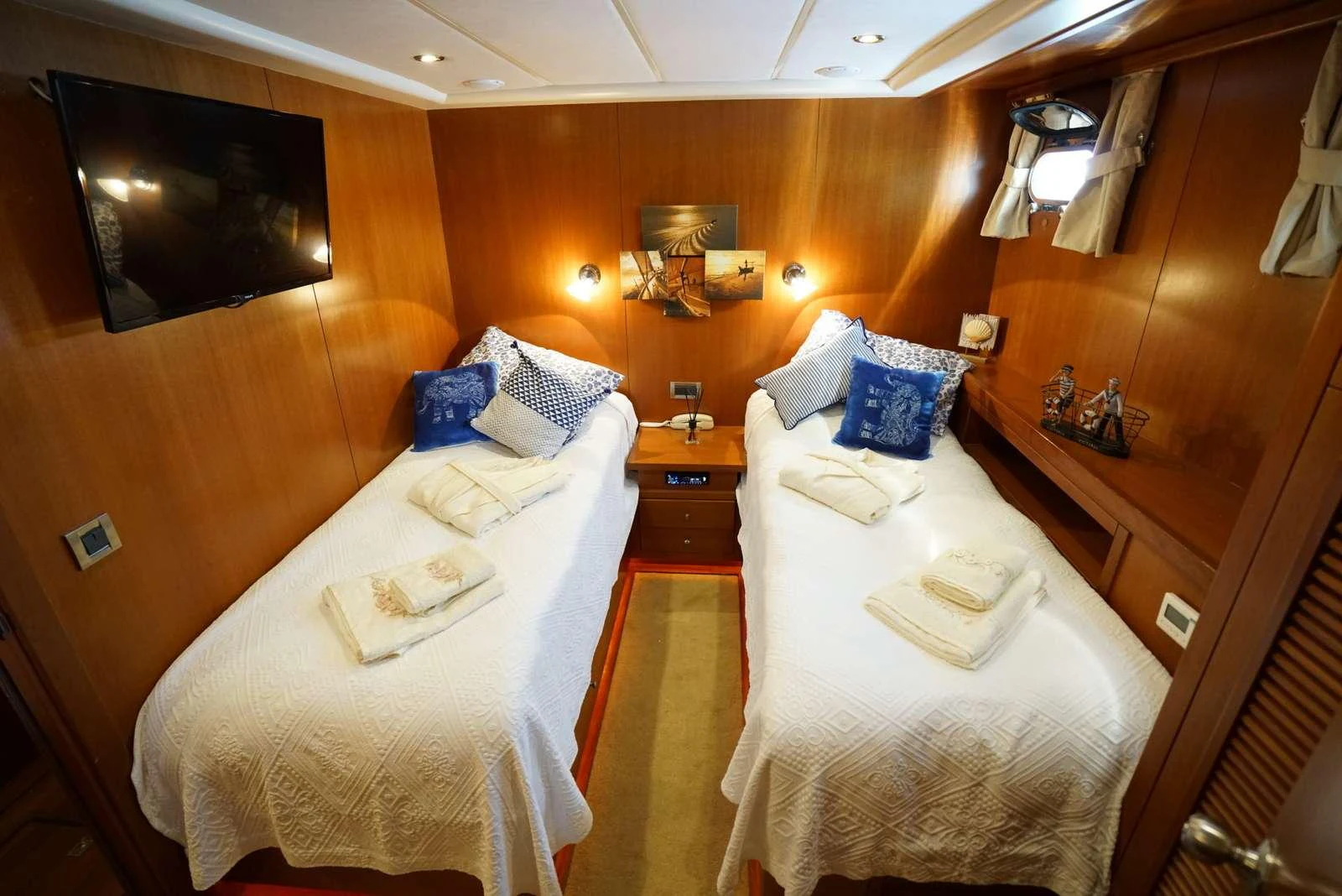 a room with two beds aboard ARABELLA Yacht for Charter