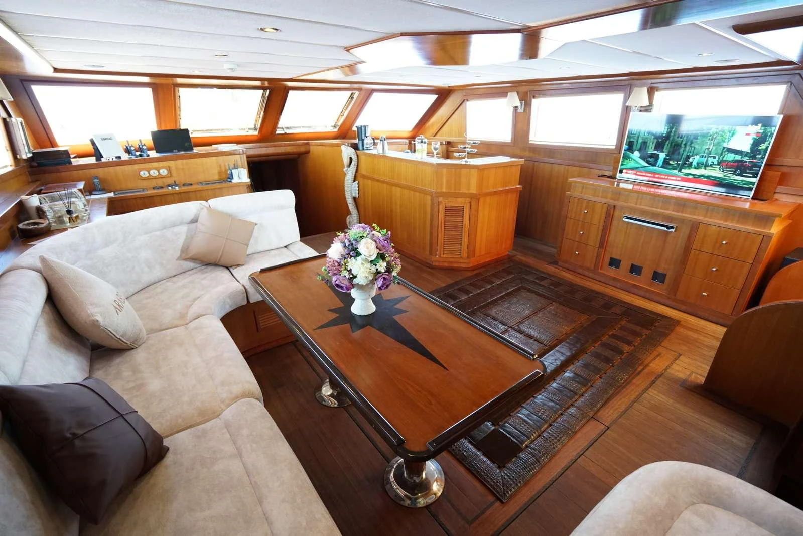 a living room with a large window aboard ARABELLA Yacht for Charter
