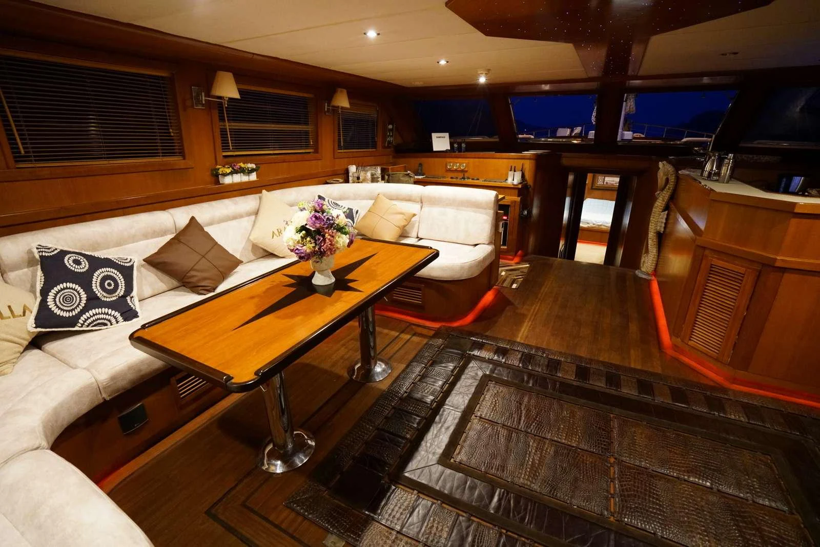 a room with a couch and a coffee table aboard ARABELLA Yacht for Charter