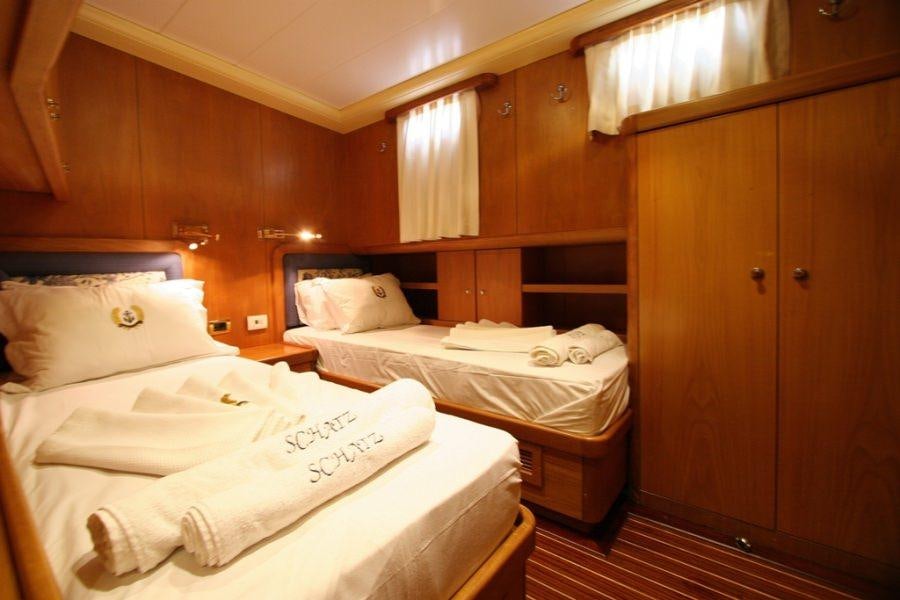 a room with wooden cabinets aboard MEIN SCHATZ Yacht for Charter