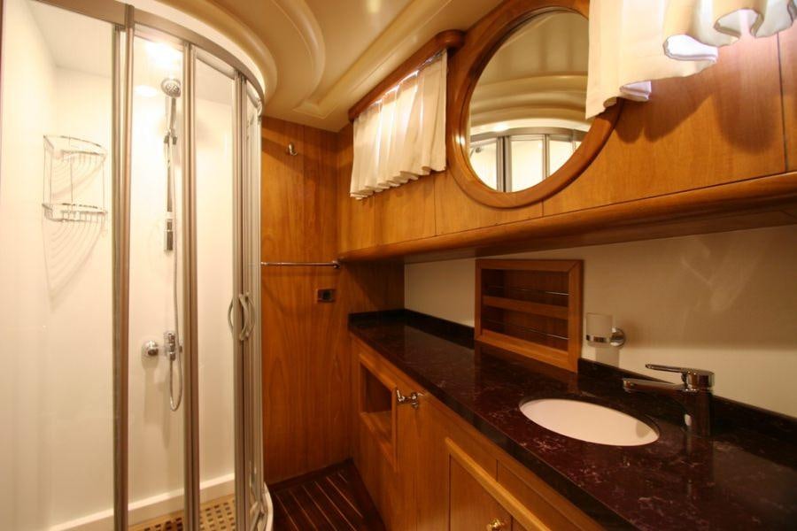 a bathroom with a glass shower aboard MEIN SCHATZ Yacht for Charter