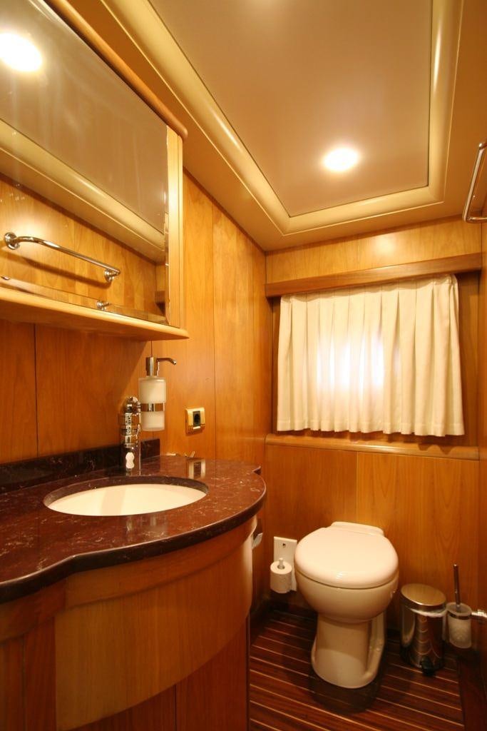 a bathroom with a sink and toilet aboard MEIN SCHATZ Yacht for Charter