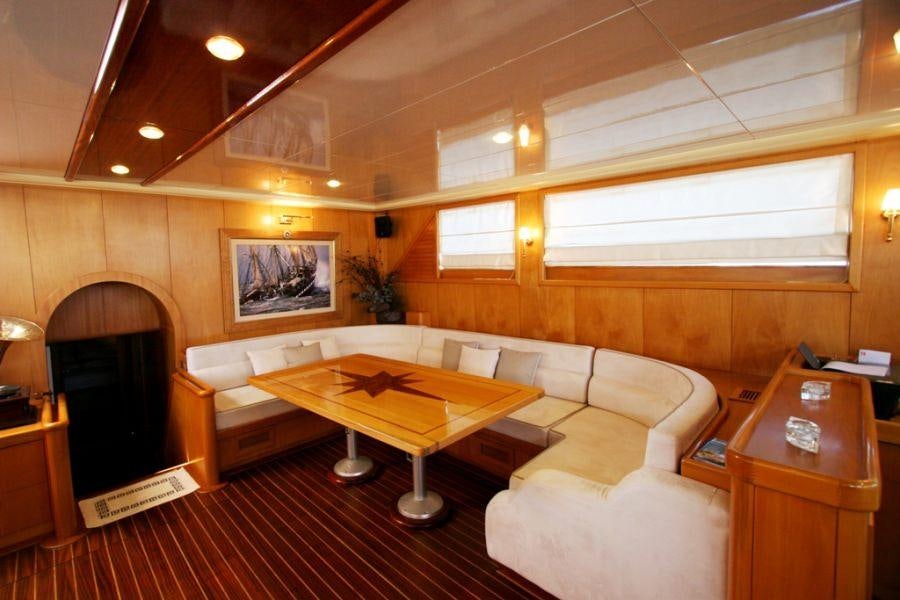 a room with a couch and a table aboard MEIN SCHATZ Yacht for Charter
