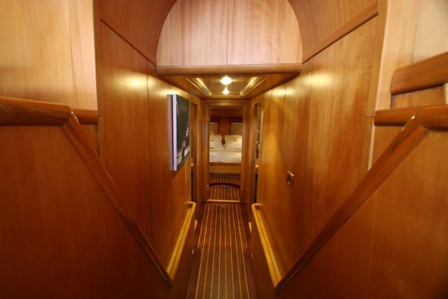 a long hallway with wooden walls aboard MEIN SCHATZ Yacht for Charter