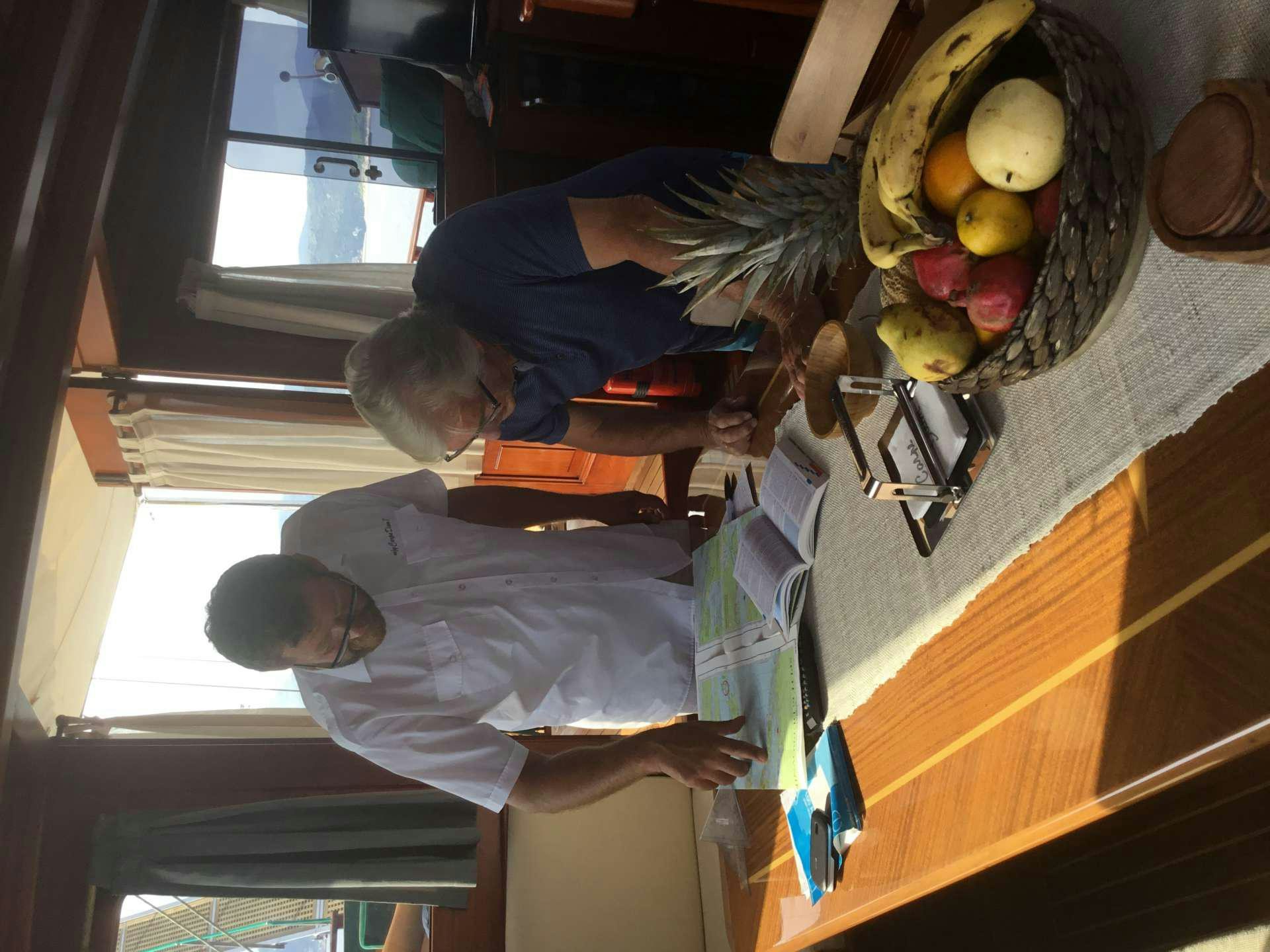 a person carrying a baby aboard Carpe Diem 7 Yacht for Charter