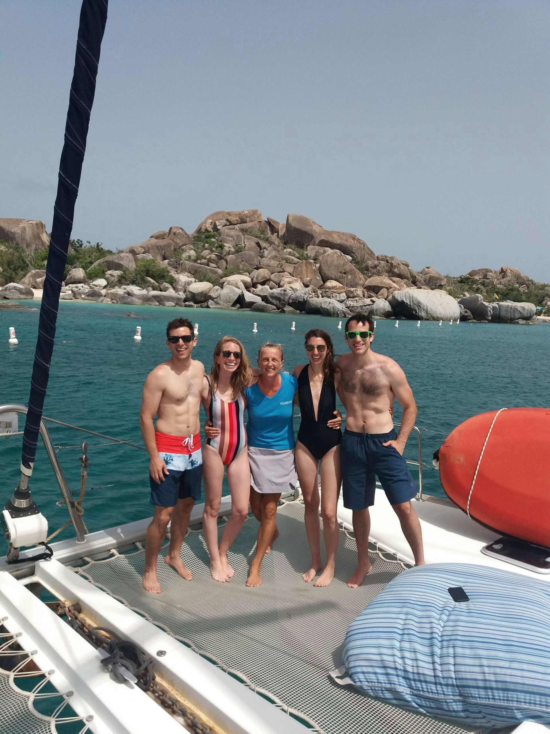 a group of people on a boat aboard FRENK Yacht for Charter