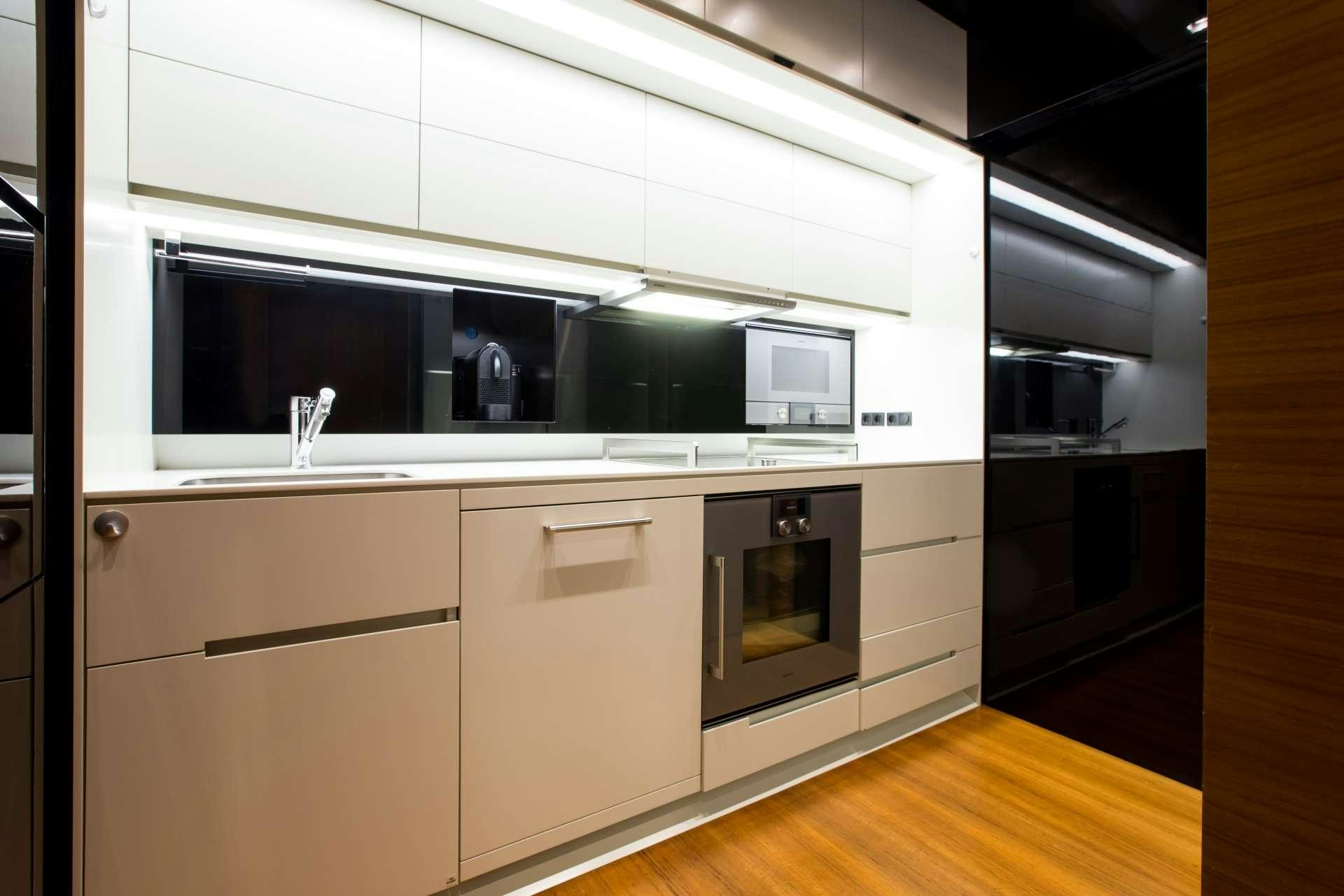 a kitchen with a microwave oven aboard KEROS ISLAND Yacht for Charter