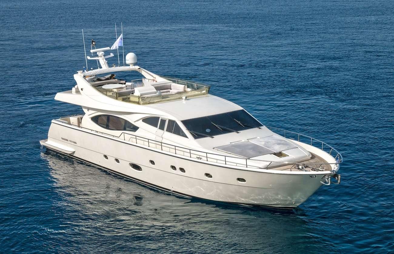 a white yacht in the water aboard AMOR Yacht for Charter