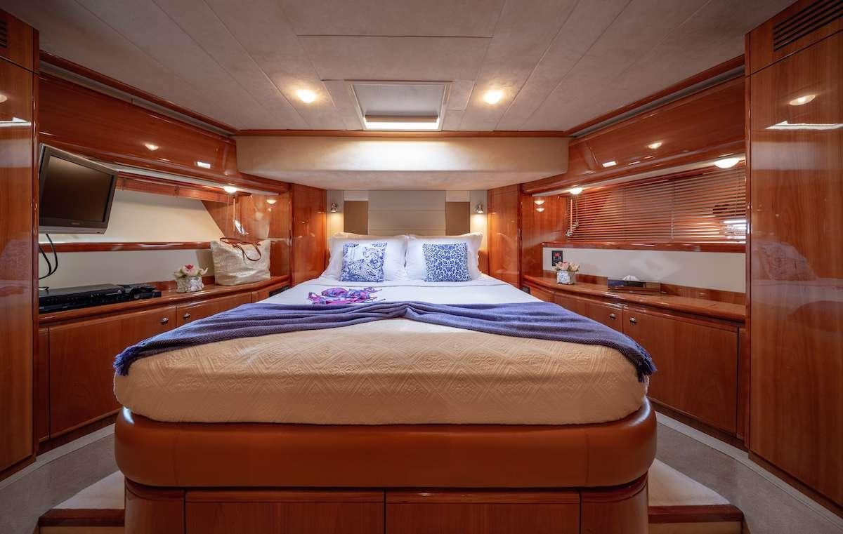a bed in a room aboard AMOR Yacht for Charter