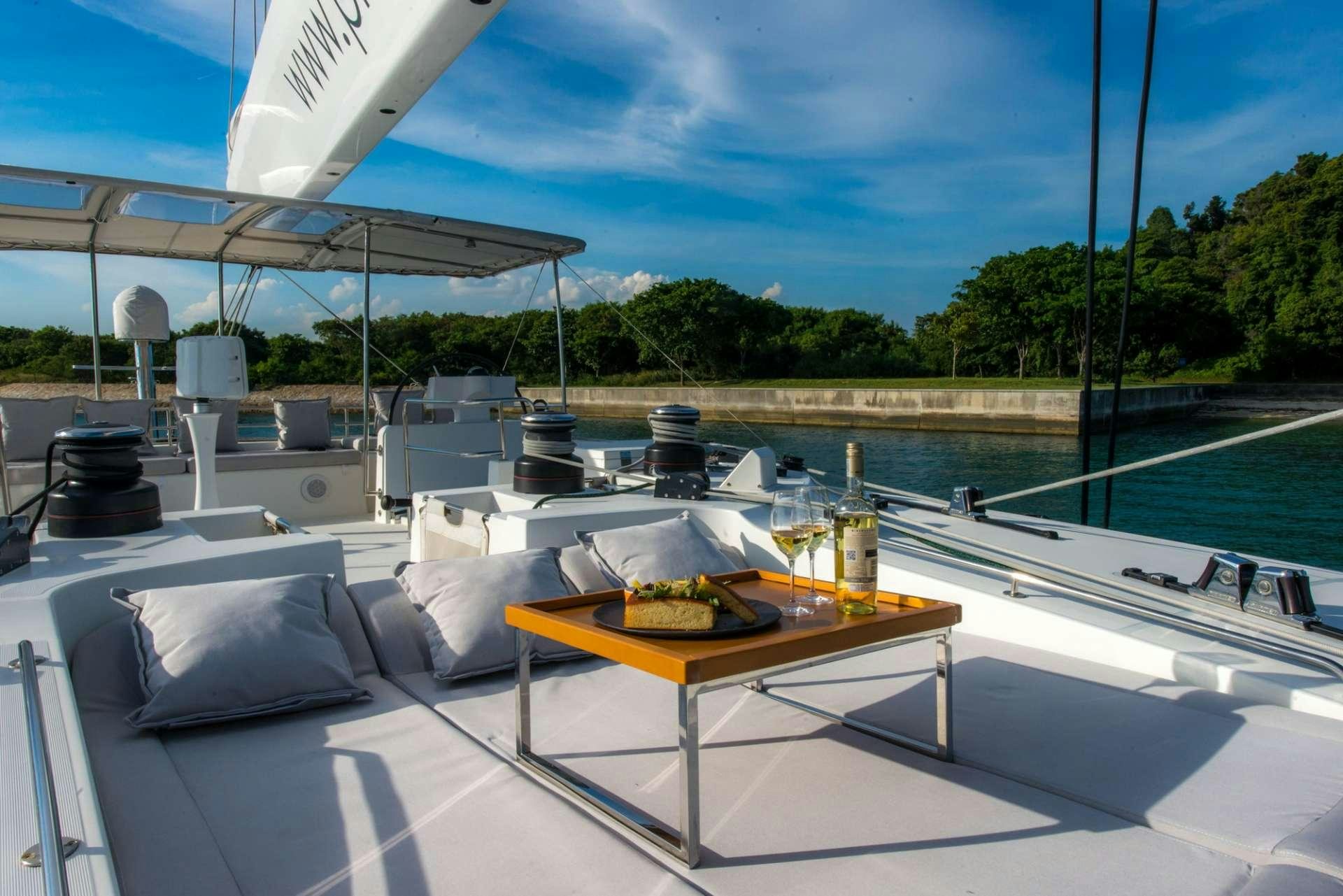 a boat on a body of water aboard PRIMETIME Yacht for Charter