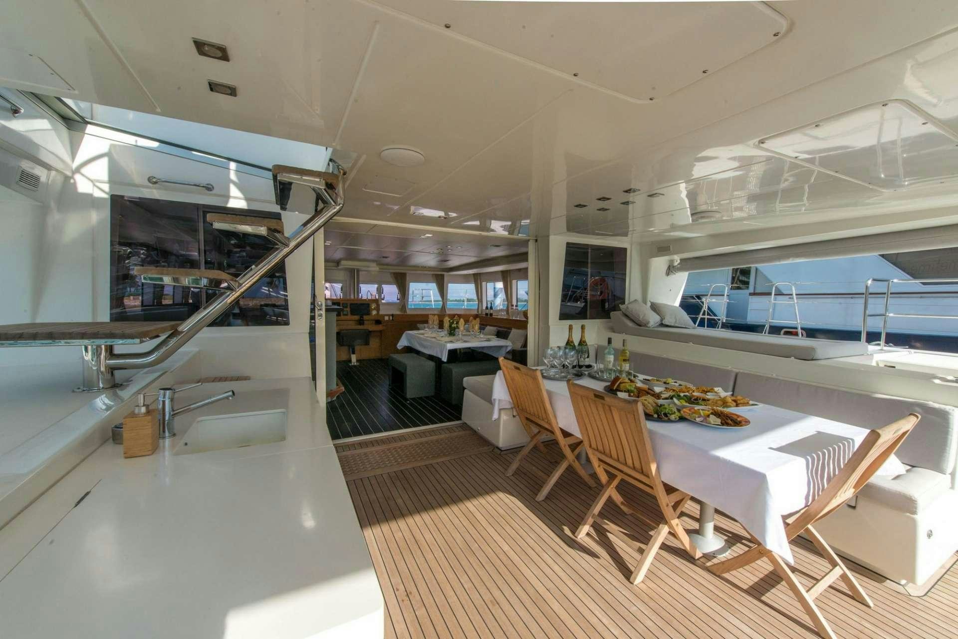 a modern looking living room aboard PRIMETIME Yacht for Charter