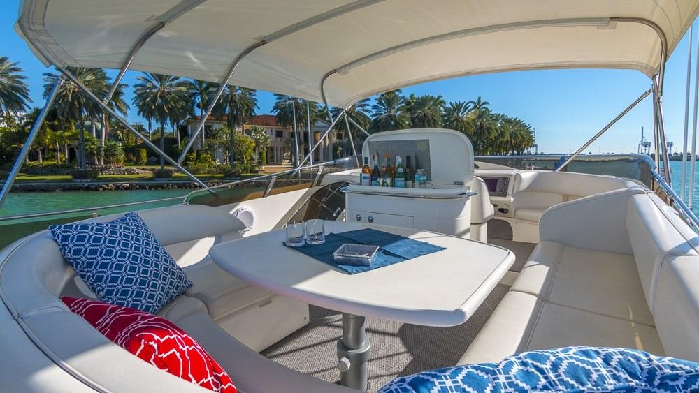 a white boat on a white surface aboard ALL GOOD Yacht for Charter