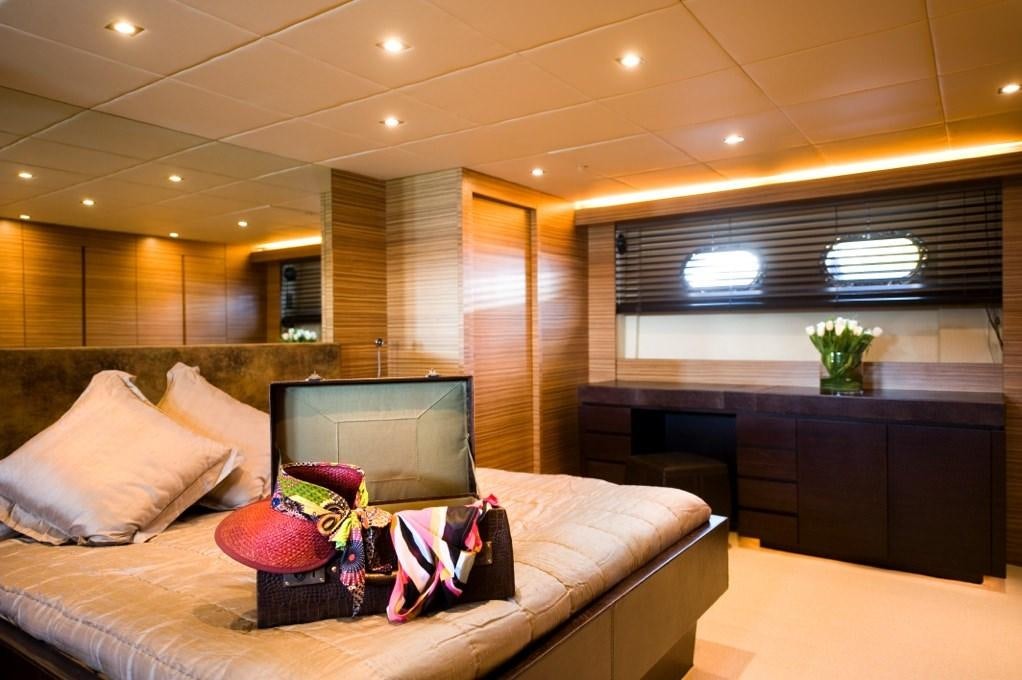 a room with a laptop and a couch aboard GIOE I Yacht for Charter
