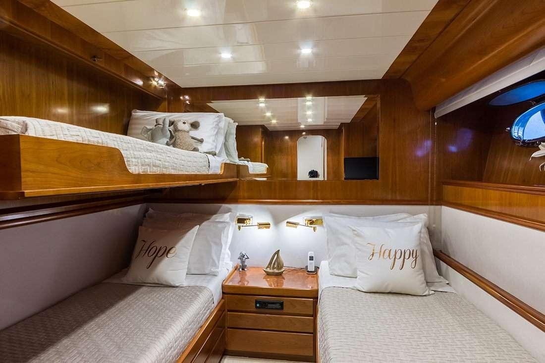a room with two beds aboard ROCK MOON Yacht for Charter