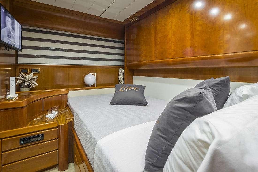 a bed with a pillow and a pillow on it aboard ROCK MOON Yacht for Charter
