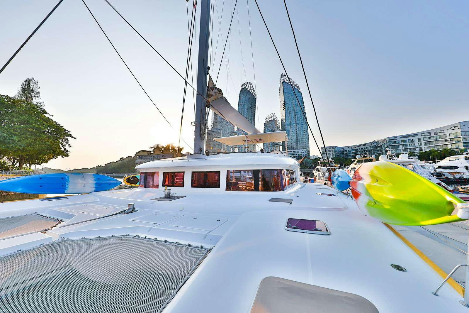 a boat with a crane in the background aboard JYOHANA Yacht for Charter