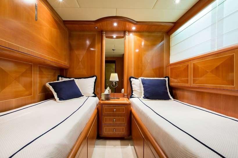 a room with two beds aboard 7 KNOTS Yacht for Charter