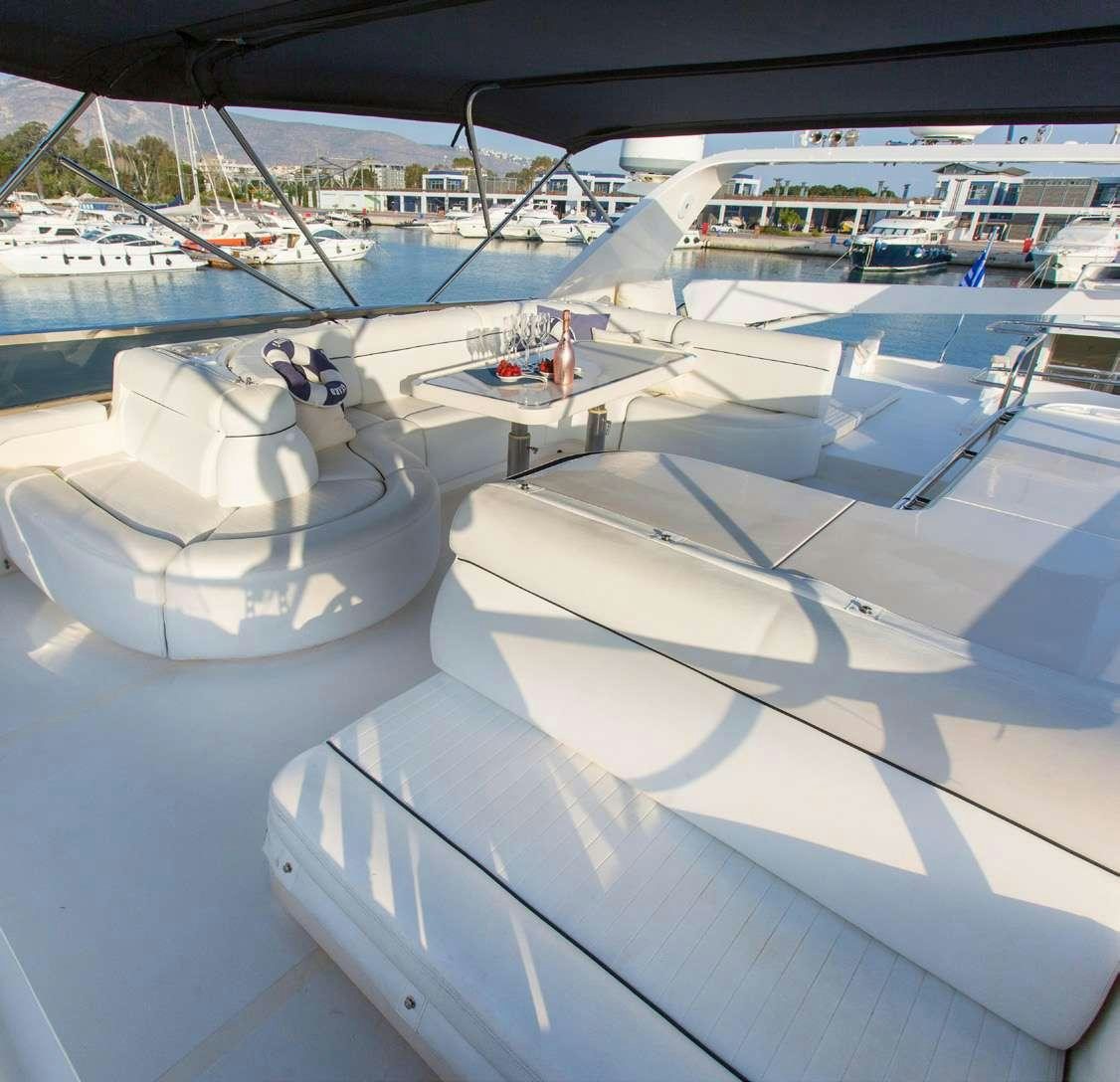 a group of boats on a body of water aboard DREAM Yacht for Charter