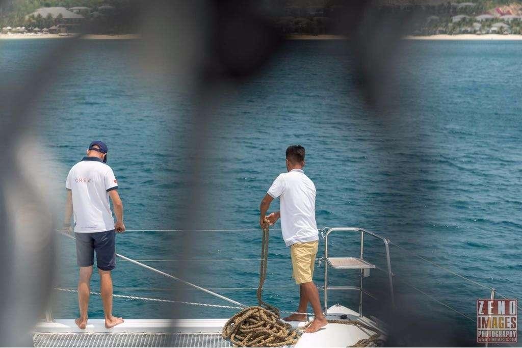 a couple of men fishing off a boat aboard ELLEN SOPHIA Yacht for Charter
