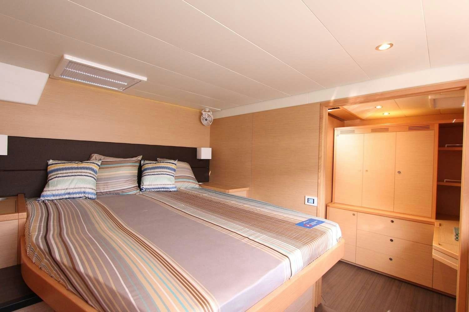 a bed in a room aboard ELLEN SOPHIA Yacht for Charter
