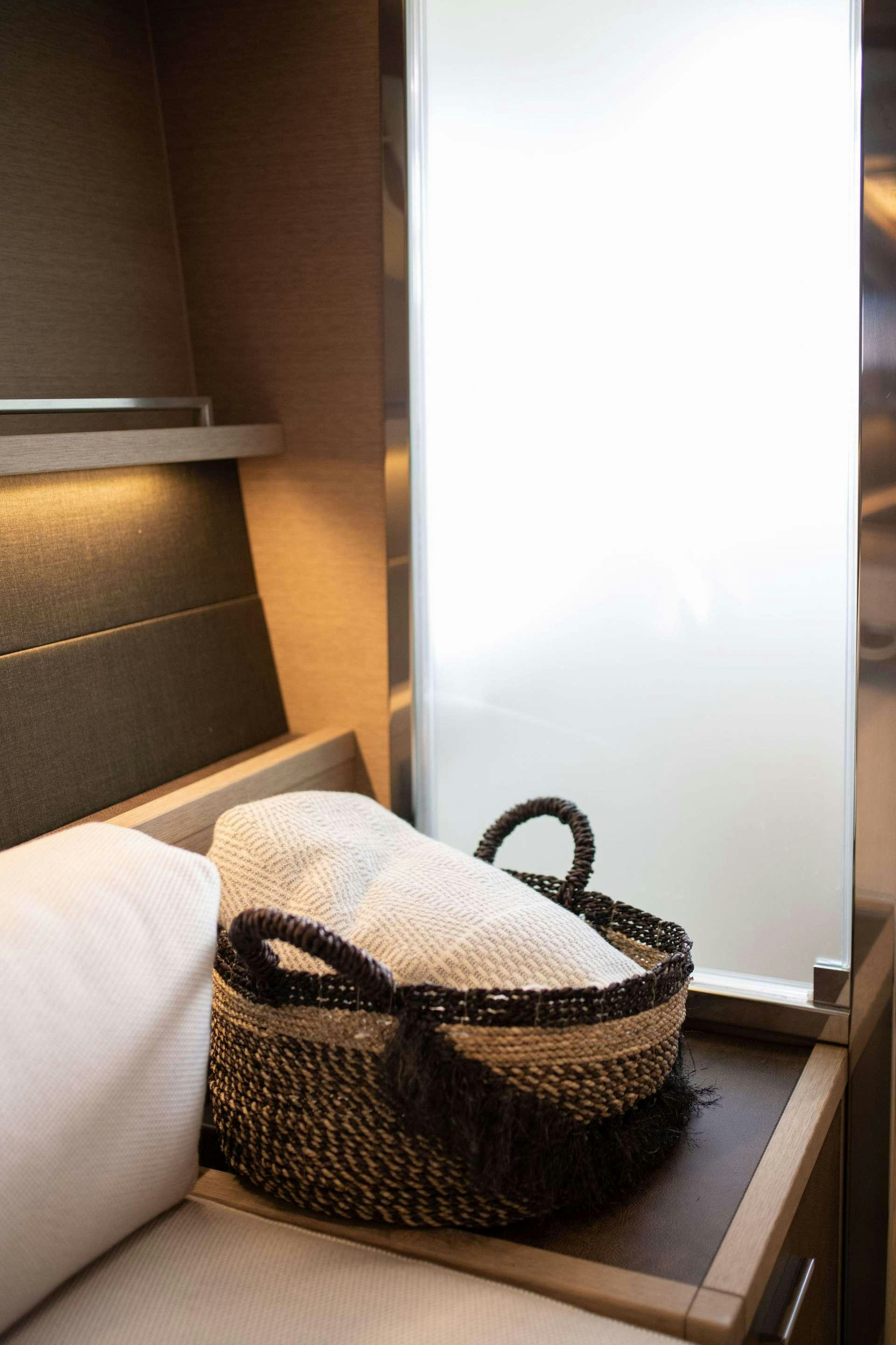 a hat on a bed aboard JUST MARIE Yacht for Charter