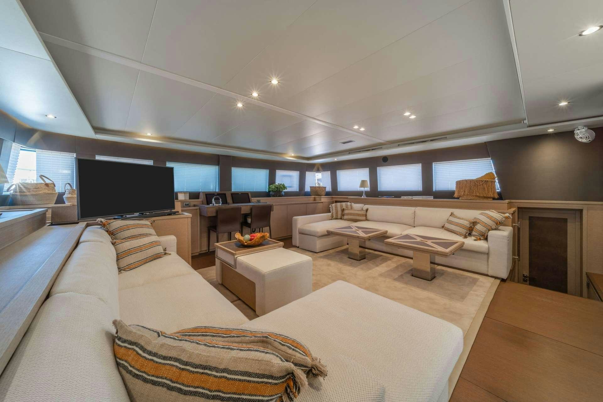 a living room with a fireplace aboard JUST MARIE Yacht for Charter