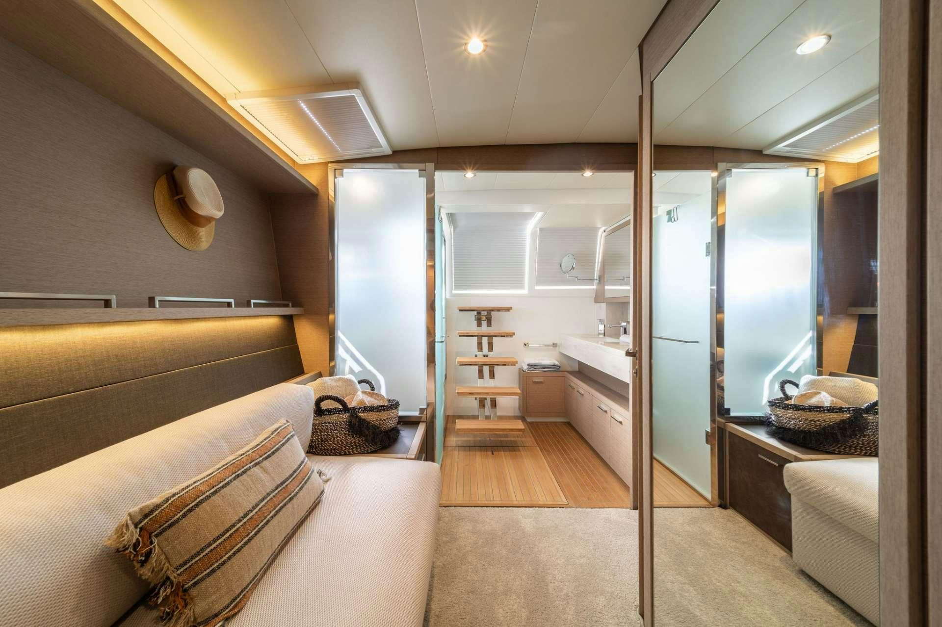 a modern bathroom with a large glass shower aboard JUST MARIE Yacht for Charter