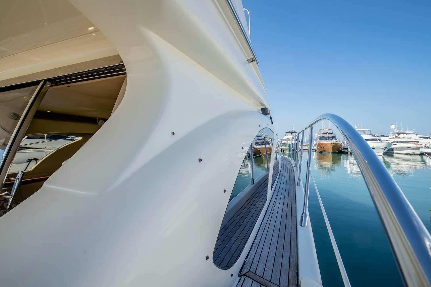 looking out of a plane at the water and boats on the water aboard AFTER 8 Yacht for Charter
