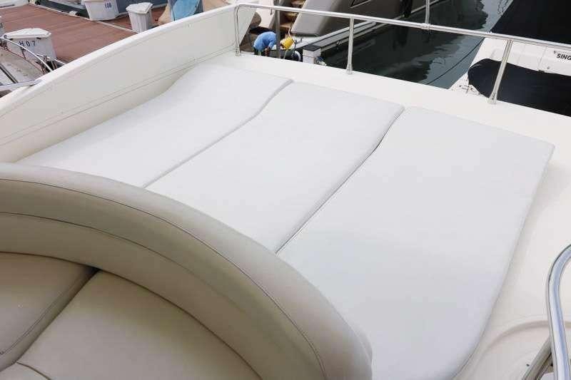 a close-up of a white car aboard AFTER 8 Yacht for Charter