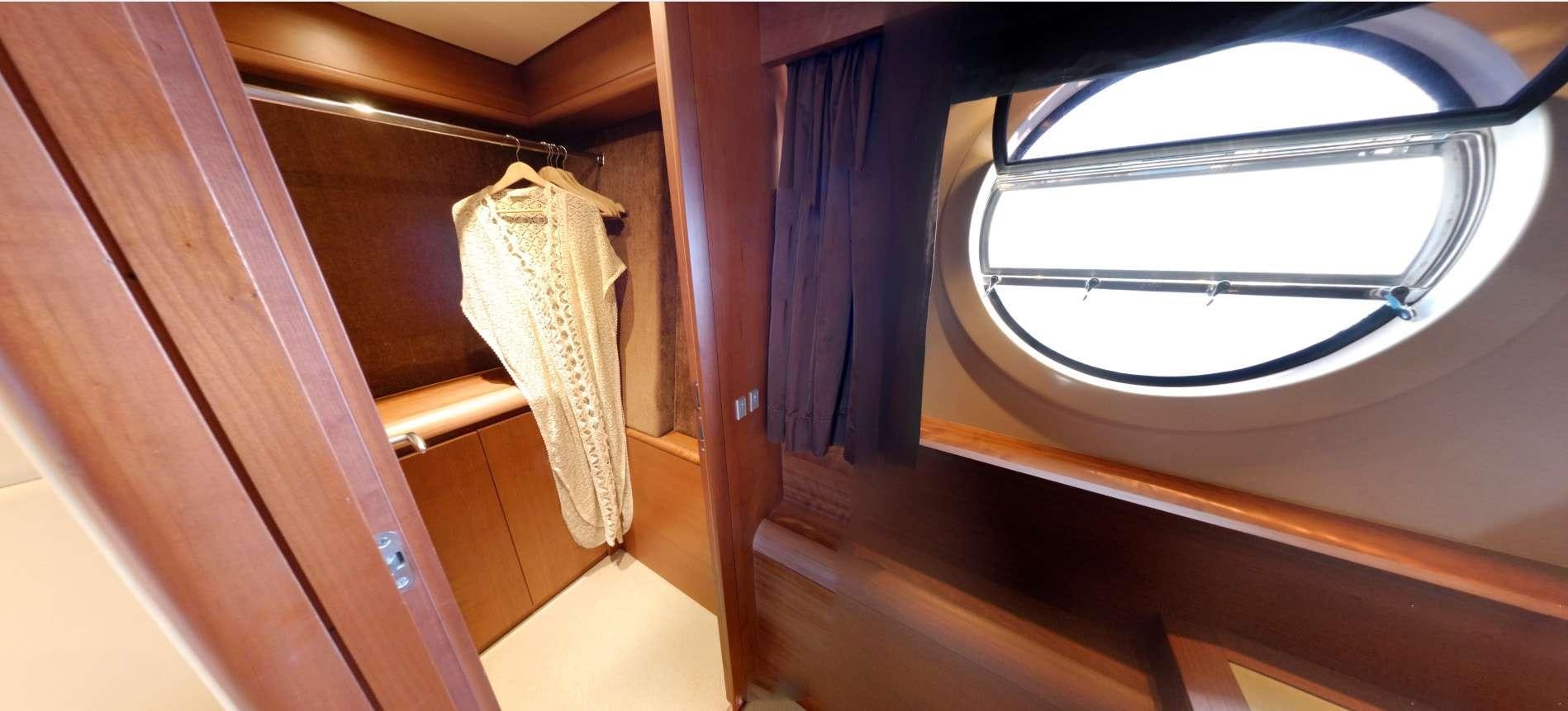 a mirror on a wall aboard QUESTA E VITA Yacht for Charter