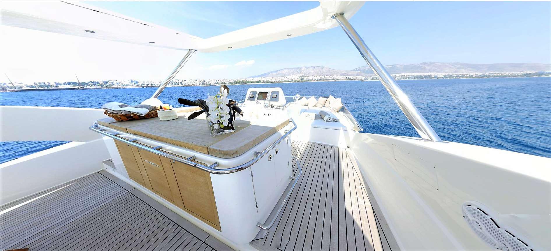 a boat with flowers on the front aboard QUESTA E VITA Yacht for Charter