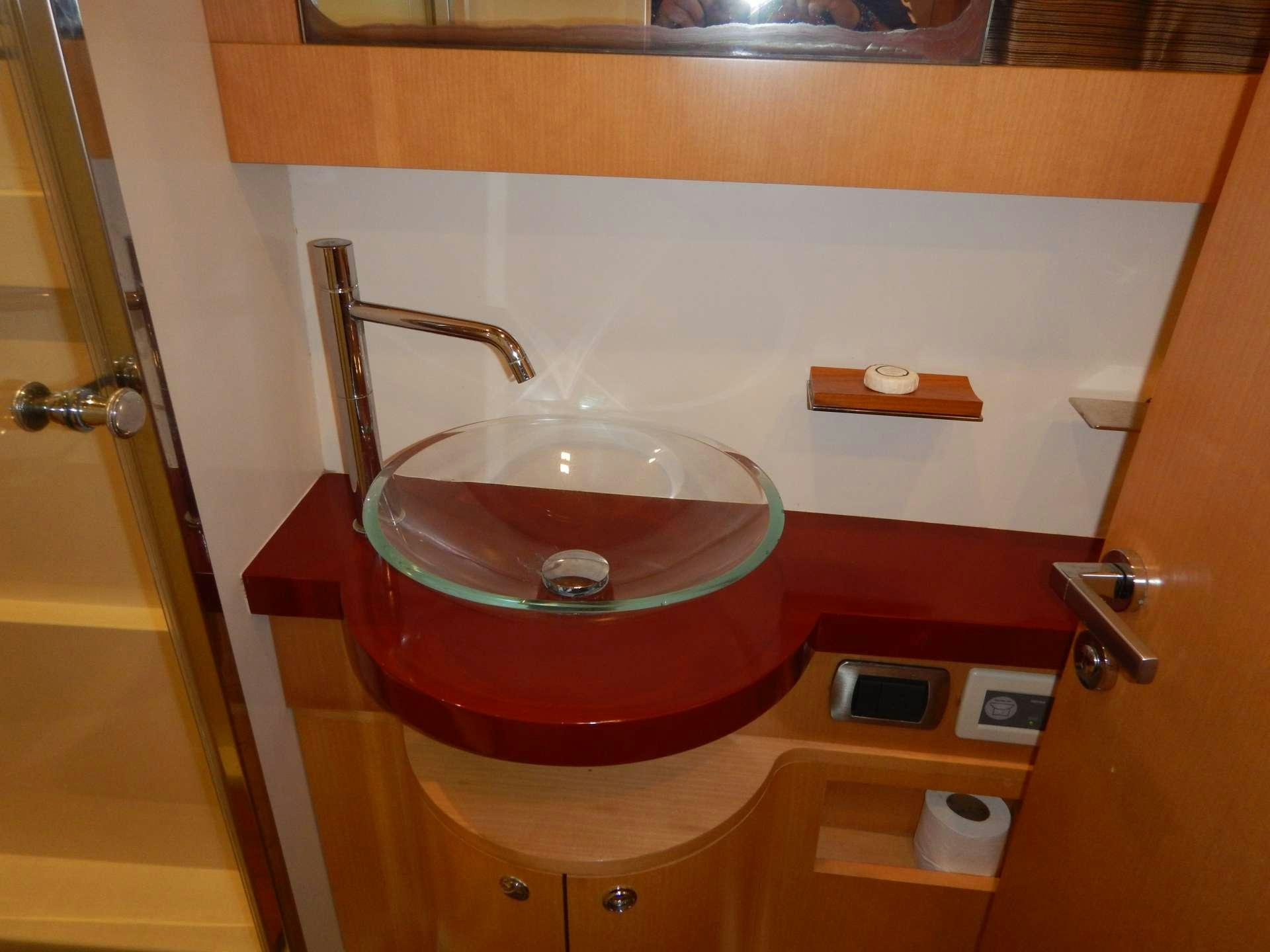 a pink sink in a bathroom aboard MAGIC STAR Yacht for Charter