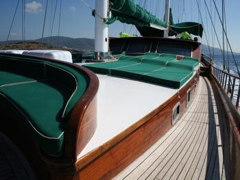 a boat on a water body aboard KAPTAN YILMAZ Yacht for Charter